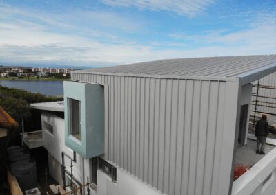 Metal wall cladding